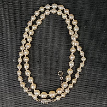 Cascading cultured pearl necklace with a...