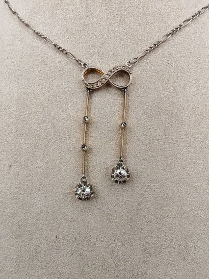 A two-tone 750‰ gold necklace in the “négligé”...