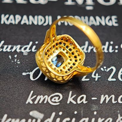 A ring made of 585‰ gold and 925‰ silver,...