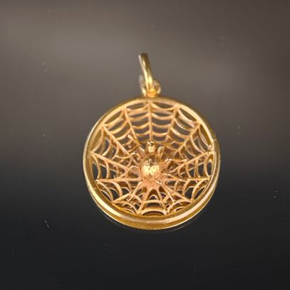 A re-drilled 750‰ yellow gold pendant featuring...