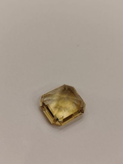 Natural emerald-cut yellow SAPHIR on paper...