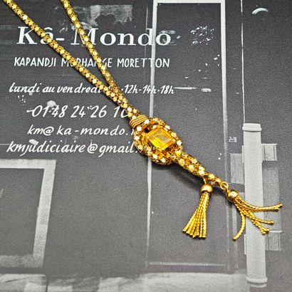 A 750‰ yellow gold necklace in the “négligé”...