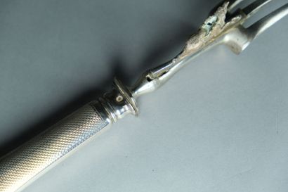 Couvert de service à découper le gigot. 
Les...