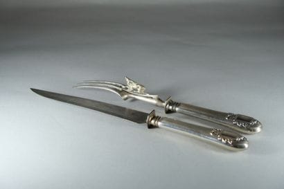 Couvert de service à découper le gigot. 
Les...