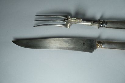 Couvert de service à découper le gigot. 
Les...