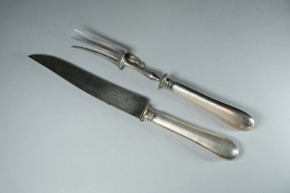Couvert de service à découper le gigot. 
Les...