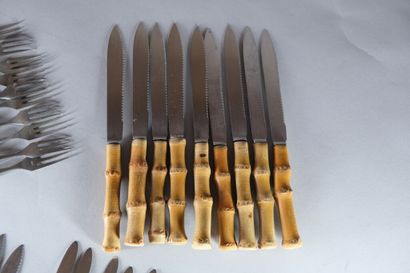 Partie de ménagère en inox, les manches en...