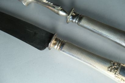 Couvert de service à découper le gigot. 
Les...