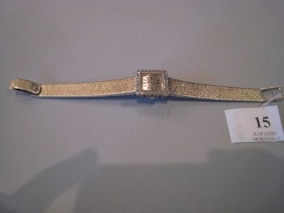 OMEGA.
Montre bracelet de dame en or blanc...