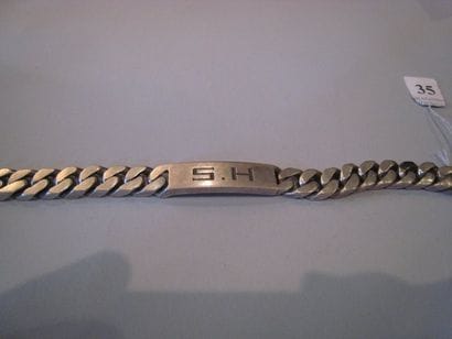Gourmette en argent (accidenté), monnogrammée...