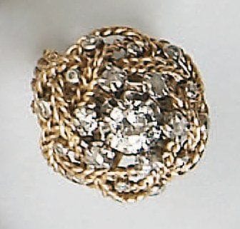 Bague dôme en ors de deux tons à décor de...