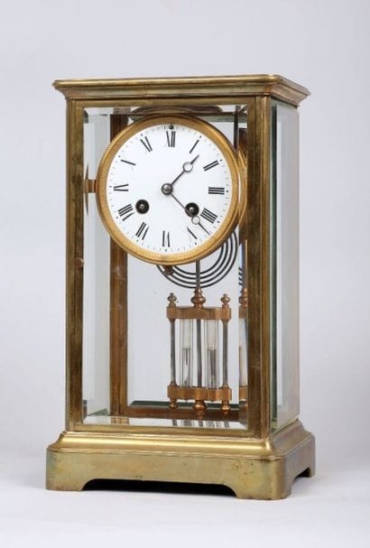 Pendule cage en bronze verni et panneau de...