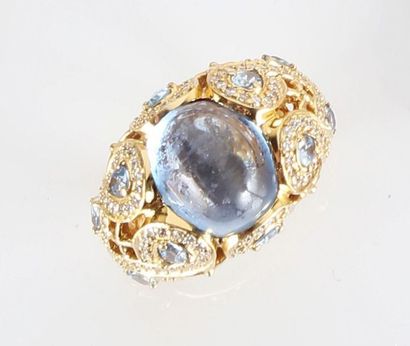 Bague en or jaune 18K (750/1000) sertie d'une...