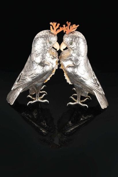 FERREIRA.
Paire de cacatoès en argent (835...