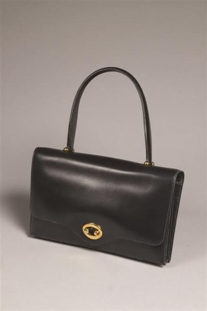 HERMÈS Paris.
Sac à main en cuir.

On joint...