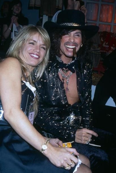 STEVEN TYLER & COMPANION.
By Rose Hartman.
Betsey...