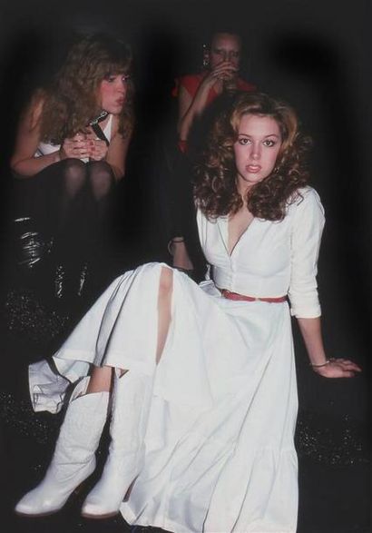WOMAN IN WHITE DRESS, PARTY GOERS.
By Rose...