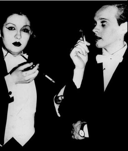 TUXEDOED COUPLE.
By Rose Hartman.
Studio...