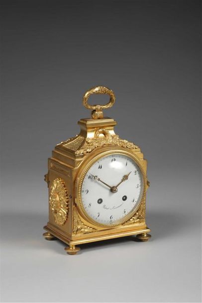 PENDULE DE CARROSSE en bronze verni or à...