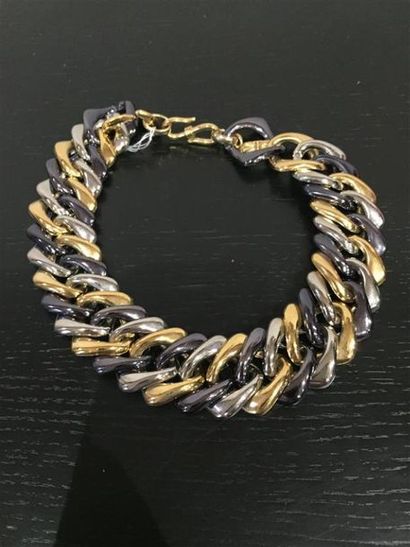 Yves SAINT-LAURENT.
Collier plastron en métal...