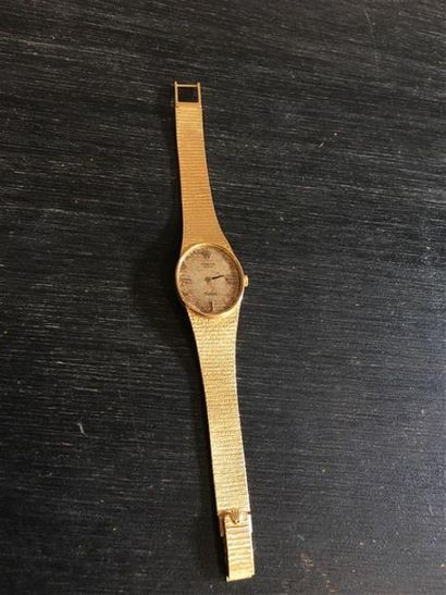 ROLEX. Montre-bracelet de dame en or jaune...