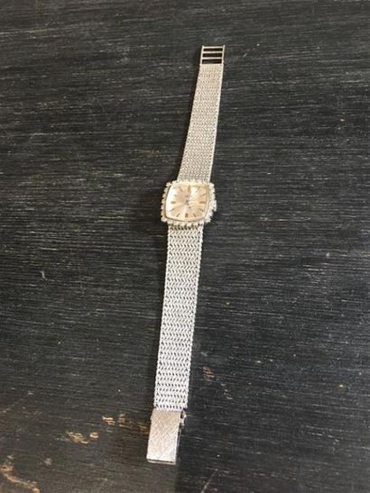 EREM. Montre bracelet de dame en or gris...