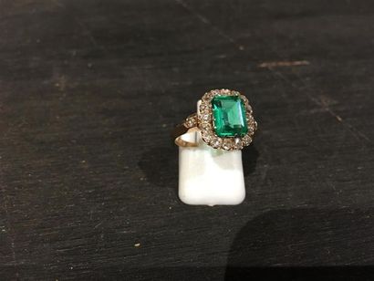 Bague entourage en or rose 18K (750 millièmes)...