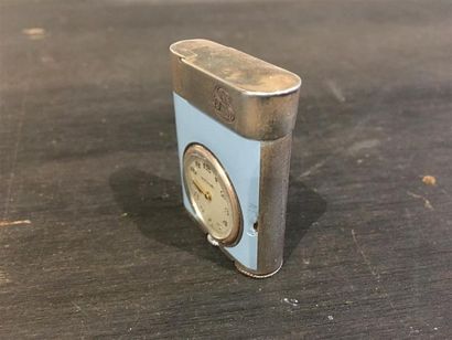 ETERNA. Montre-briquet en argent (925 millièmes)...