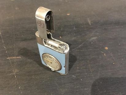ETERNA. Montre-briquet en argent (925 millièmes)...