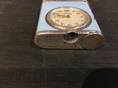 ETERNA. Montre-briquet en argent (925 millièmes)...