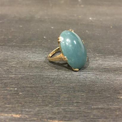 Bague en or jaune 18K (750 millièmes) ornée...