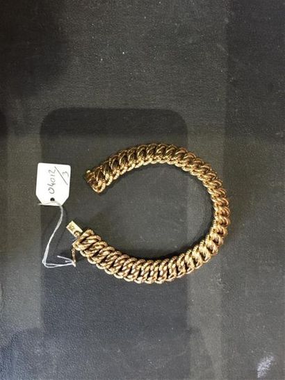 BRACELET en or 750 millièmes, à maille américaine.
L....