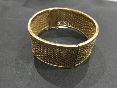 BRACELET rigide en or jaune 750 millièmes...