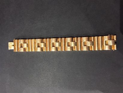 Bracelet tank en or rose 750 millièmes. Vers...