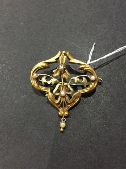 Petite broche barrette en or 18K (750/1000)...
