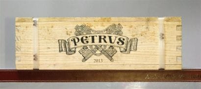 1 bouteille PETRUS 2013. 
Logé en coffre...