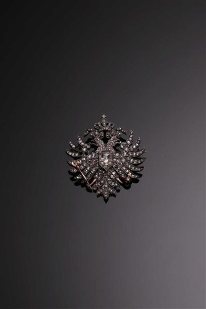 BROCHE en or bas-titre et argent, représentant...