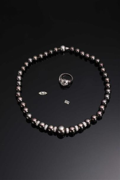 ** LOT DE DIAMANTS comprenant :
- Un diamant...