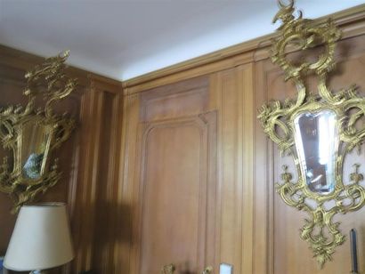 Suite de quatre grands miroirs d'éclairage...