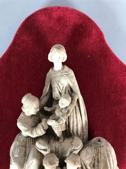 Bénitier avec scène en haut relief : deux...