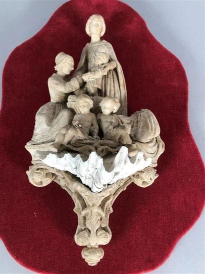 Bénitier avec scène en haut relief : deux...