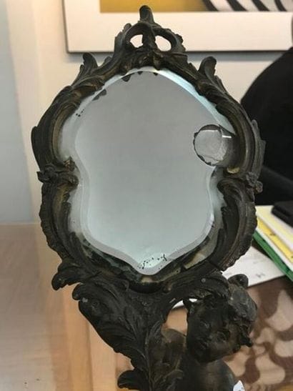 Paire de miroirs de table figurant angel...