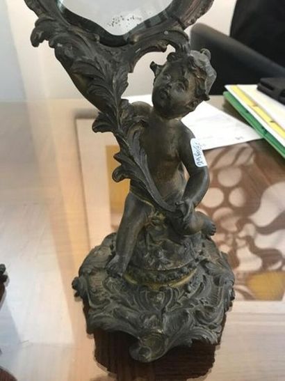 Paire de miroirs de table figurant angel...