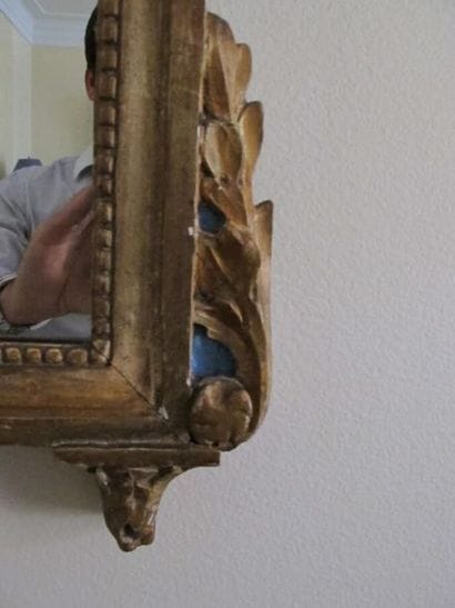 Miroir en bois sculpté et doré d'époque Louis...
