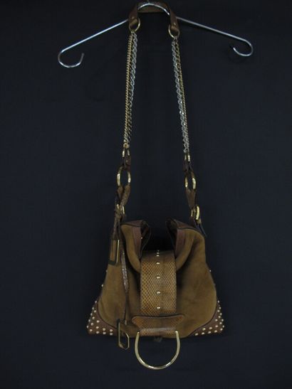 DOLCE et GABBANA 

Sac en cuir clouté et...