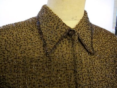 Ensemble de deux vestes en perles brodées...