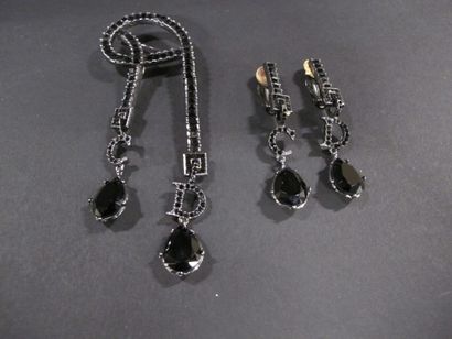 DIOR 

Ensemble boucles d'oreilles et une...