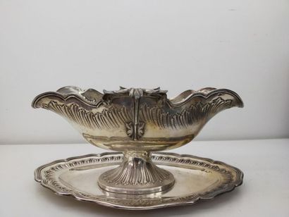 Saucière en argent à décor rocaille
Poids...