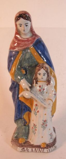 Sainte Anne enseignante en faïence polychrome....