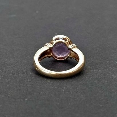 Bague en or jaune 18K serti d'une améthyste
Poids...
